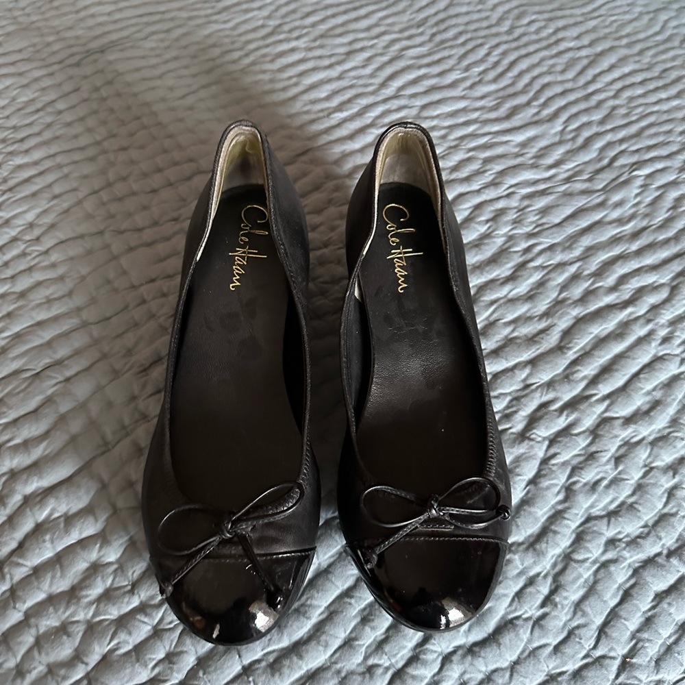 Cole Haan black wedge pumps with Nike Air soles. Size 6